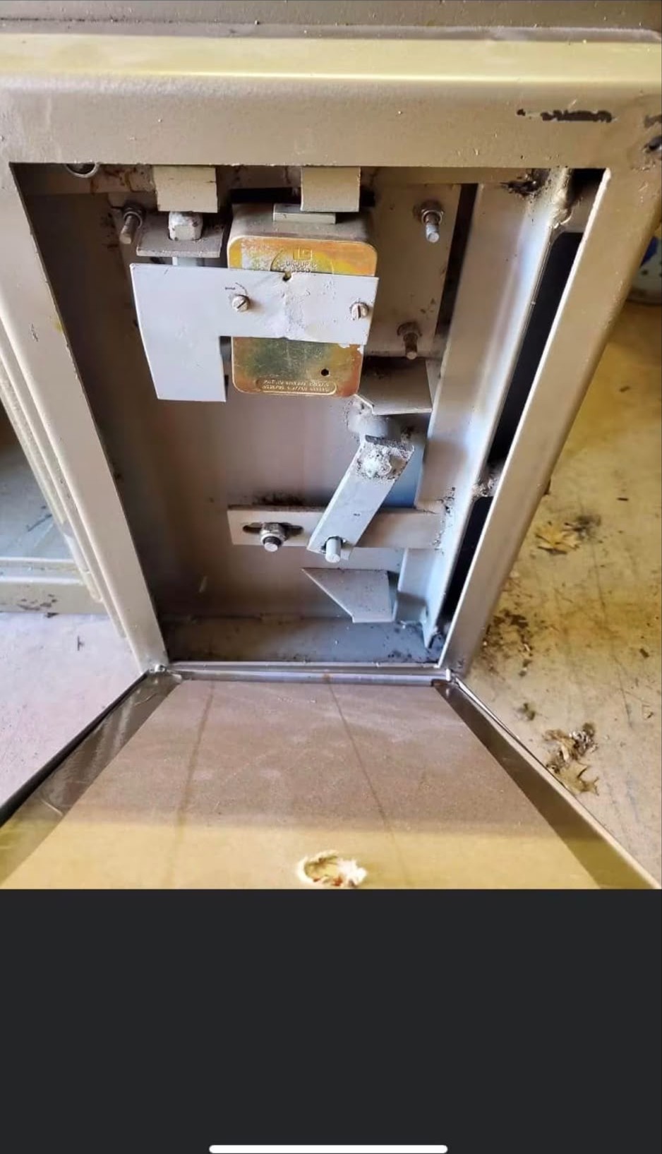 Bolt-work and internal mechanism of a heavy safe door opened in London